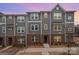 Charming townhome exterior featuring neutral siding, brick accents, and well-maintained landscaping at 4548 Millennium Ave, Charlotte, NC 28217