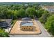 Aerial view of two new construction homes surrounded by lush greenery and a street at 507 Bowman Rd, Charlotte, NC 28217