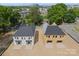 Aerial view of two new construction homes with paved driveways in a suburban community at 507 Bowman Rd, Charlotte, NC 28217