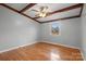 Spacious bedroom featuring hardwood floors, a ceiling fan, and natural light at 512 Rhodes Ave, Kings Mountain, NC 28086