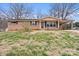 Charming brick home with a covered porch and carport at 512 Rhodes Ave, Kings Mountain, NC 28086