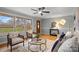 Bright living room featuring a large window, neutral decor and hardwood flooring at 512 Rhodes Ave, Kings Mountain, NC 28086