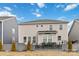 Back exterior view showcasing a patio area and well-maintained yard, perfect for outdoor living and enjoying the scenery at 531 Red Wolf Ln, Clover, SC 29710