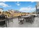 Spacious back patio featuring an outdoor dining area, barstools, and neighborhood views at 531 Red Wolf Ln, Clover, SC 29710
