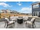 Spacious back patio featuring outdoor seating, a firepit, and neighborhood views at 531 Red Wolf Ln, Clover, SC 29710
