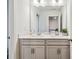 Bright bathroom featuring double sinks, a large mirror, and neutral-toned cabinetry at 531 Red Wolf Ln, Clover, SC 29710