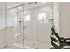 Modern bathroom boasting a glass-enclosed shower with bench, tiled walls, and dual shower heads at 531 Red Wolf Ln, Clover, SC 29710