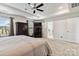Spacious bedroom featuring plush carpet, ceiling fan, and an abundance of natural light at 531 Red Wolf Ln, Clover, SC 29710