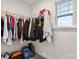 Walk-in closet with metal shelving, rods with hanging storage, and a bright window at 531 Red Wolf Ln, Clover, SC 29710