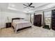 Spacious main bedroom features carpet, tray ceiling, neutral walls, a ceiling fan, and natural light at 531 Red Wolf Ln, Clover, SC 29710