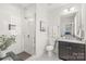 Modern bathroom featuring a glass-enclosed shower, stylish vanity, and elegant fixtures at 5717 Closeburn Rd, Charlotte, NC 28210