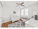 Bedroom includes crib, ample natural light from the windows, and neutral decor at 5717 Closeburn Rd, Charlotte, NC 28210