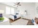 Stylish bedroom with a comfortable bed, minimalist decor, and ample natural light at 5717 Closeburn Rd, Charlotte, NC 28210