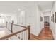Bright hallway features hardwood floors, built-in cabinets, and access to multiple rooms at 5717 Closeburn Rd, Charlotte, NC 28210