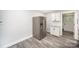 Kitchen featuring stainless steel refrigerator and sleek, white cabinets at 621 Bristol Dr, Statesville, NC 28677