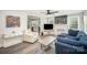 Inviting living room with modern furnishings and an open floor plan to the kitchen at 621 Bristol Dr, Statesville, NC 28677