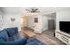 Comfortable living room with hardwood floors and open access to kitchen and hallway at 621 Bristol Dr, Statesville, NC 28677