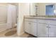 Bathroom features white cabinets, granite countertops, and a shower-tub combo at 8418 Loxton Cir, Charlotte, NC 28214