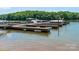 Multiple boat slips on a tranquil lake, ideal for boating enthusiasts and waterfront living at 8418 Loxton Cir, Charlotte, NC 28214