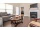 Bright living room with hardwood floors, fireplace and neutral decor at 8418 Loxton Cir, Charlotte, NC 28214