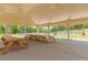 Covered pavilion area with picnic tables, creating a shady space for outdoor gatherings and relaxation at 8418 Loxton Cir, Charlotte, NC 28214
