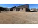 View of the backyard showing the screened patio and grassy area at 9432 Liberty Hill Dr, Mint Hill, NC 28227