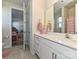 Well-lit bathroom with a white vanity, quartz countertop, and modern fixtures at 9432 Liberty Hill Dr, Mint Hill, NC 28227