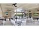 Inviting clubhouse area with a covered patio, multiple TVs and ample seating at 9432 Liberty Hill Dr, Mint Hill, NC 28227