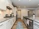 Gourmet kitchen featuring granite countertops, stainless steel appliances, and a spacious island with sink at 9432 Liberty Hill Dr, Mint Hill, NC 28227