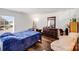 Comfortable bedroom with natural light, dark wood floors, and ample closet space at 10316 Stineway Ct, Pineville, NC 28134