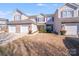 Charming two-story townhouse featuring an attached garage and well-maintained landscaping at 10316 Stineway Ct, Pineville, NC 28134