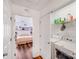 Convenient laundry room with modern appliances and added storage shelves at 10316 Stineway Ct, Pineville, NC 28134