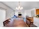 Bright living room with fireplace, hardwood floors, and ample natural light at 10316 Stineway Ct, Pineville, NC 28134