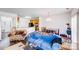 Inviting living room with a large sofa, hardwood floors, and an open layout at 10316 Stineway Ct, Pineville, NC 28134