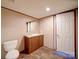 Bathroom featuring neutral walls, durable floors, vanity, and well-lit mirror at 1085 Cedar Hill Dr, Rockwell, NC 28138