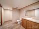Bathroom features a granite counter and neutral wall paint at 1085 Cedar Hill Dr, Rockwell, NC 28138