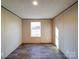 Bedroom featuring a window that provides natural light at 1085 Cedar Hill Dr, Rockwell, NC 28138