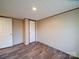 This bedroom features durable floors and neutral wall paint at 1085 Cedar Hill Dr, Rockwell, NC 28138