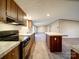 The kitchen features dark wood cabinets and a large island at 1085 Cedar Hill Dr, Rockwell, NC 28138