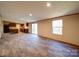 A large living area features sliding glass doors at 1085 Cedar Hill Dr, Rockwell, NC 28138