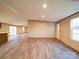 Open-concept layout showcasing new floors, neutral walls, and seamless transition between living spaces at 1085 Cedar Hill Dr, Rockwell, NC 28138
