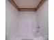 Bathroom shower and tub, finished with white shower tiles at 1085 Cedar Hill Dr, Rockwell, NC 28138