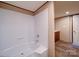 Bathroom shower and tub, finished with white shower tiles at 1085 Cedar Hill Dr, Rockwell, NC 28138