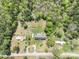 Bird's-eye view of the property, highlighting the spacious land, multiple structures, and mature trees at 1766 Duckwood Rd, Lancaster, SC 29720