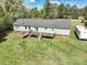 Aerial view of a home featuring a large backyard with wooden deck, boat, and recreational vehicle at 1766 Duckwood Rd, Lancaster, SC 29720