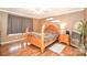 Cozy bedroom with natural light, neutral tones, and wood flooring at 1766 Duckwood Rd, Lancaster, SC 29720