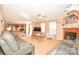 Spacious living room featuring a fireplace, comfortable seating, and plenty of natural light at 1766 Duckwood Rd, Lancaster, SC 29720