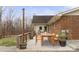 Inviting wood deck with dining table and chairs, perfect for outdoor entertaining and enjoying the peaceful surroundings at 201 Indian Hill Rd, Union Grove, NC 28689