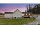 Spacious backyard showcasing a brick patio and a well-maintained lawn at 201 Indian Hill Rd, Union Grove, NC 28689