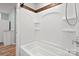 Bathroom featuring a bright white shower/tub combo at 201 Indian Hill Rd, Union Grove, NC 28689